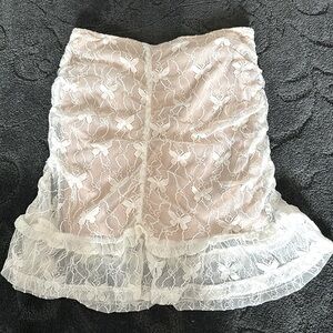 Pink and crème butterfly lace skirt. Size small